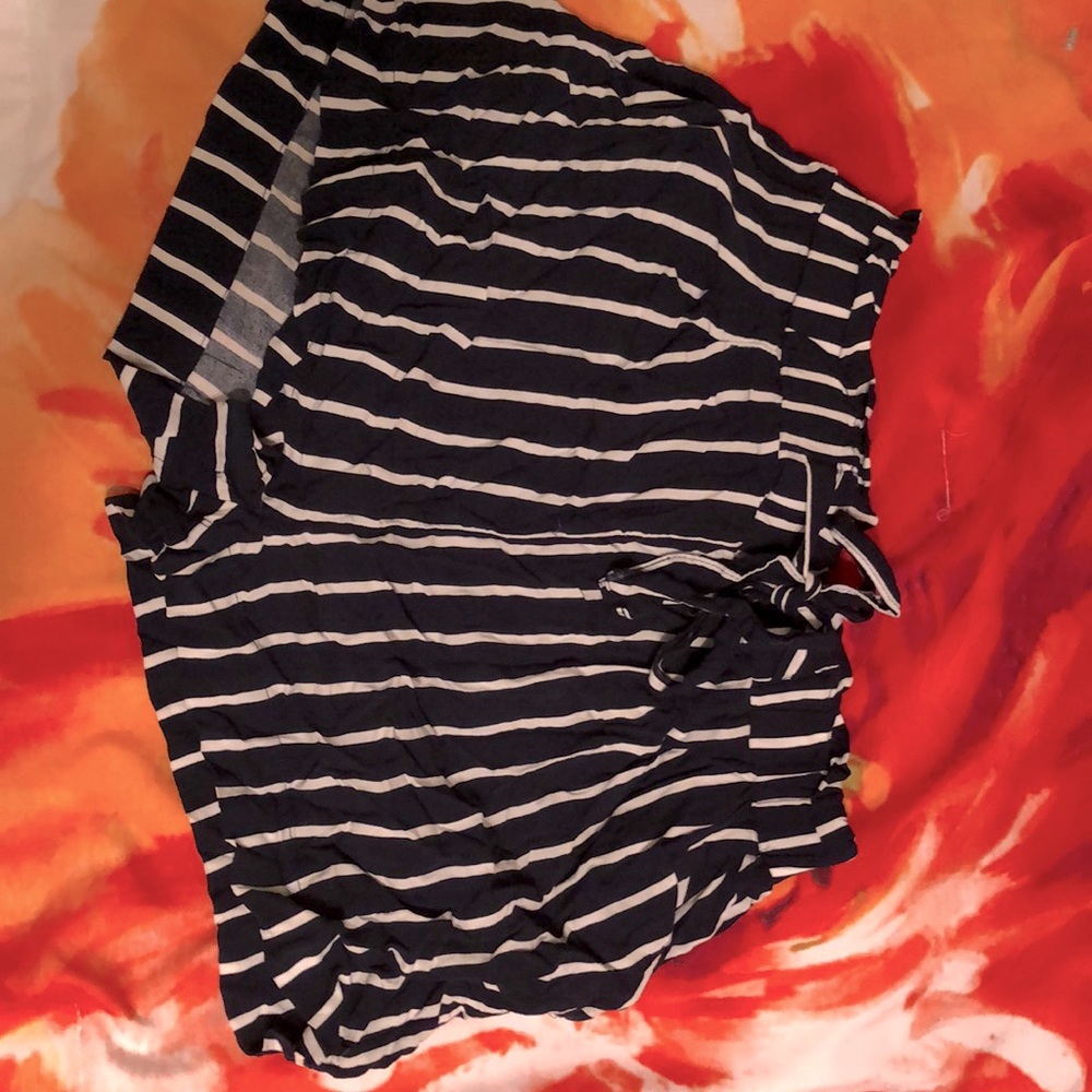 Navy Blue and white striped shorts they’re a L but feels like a M